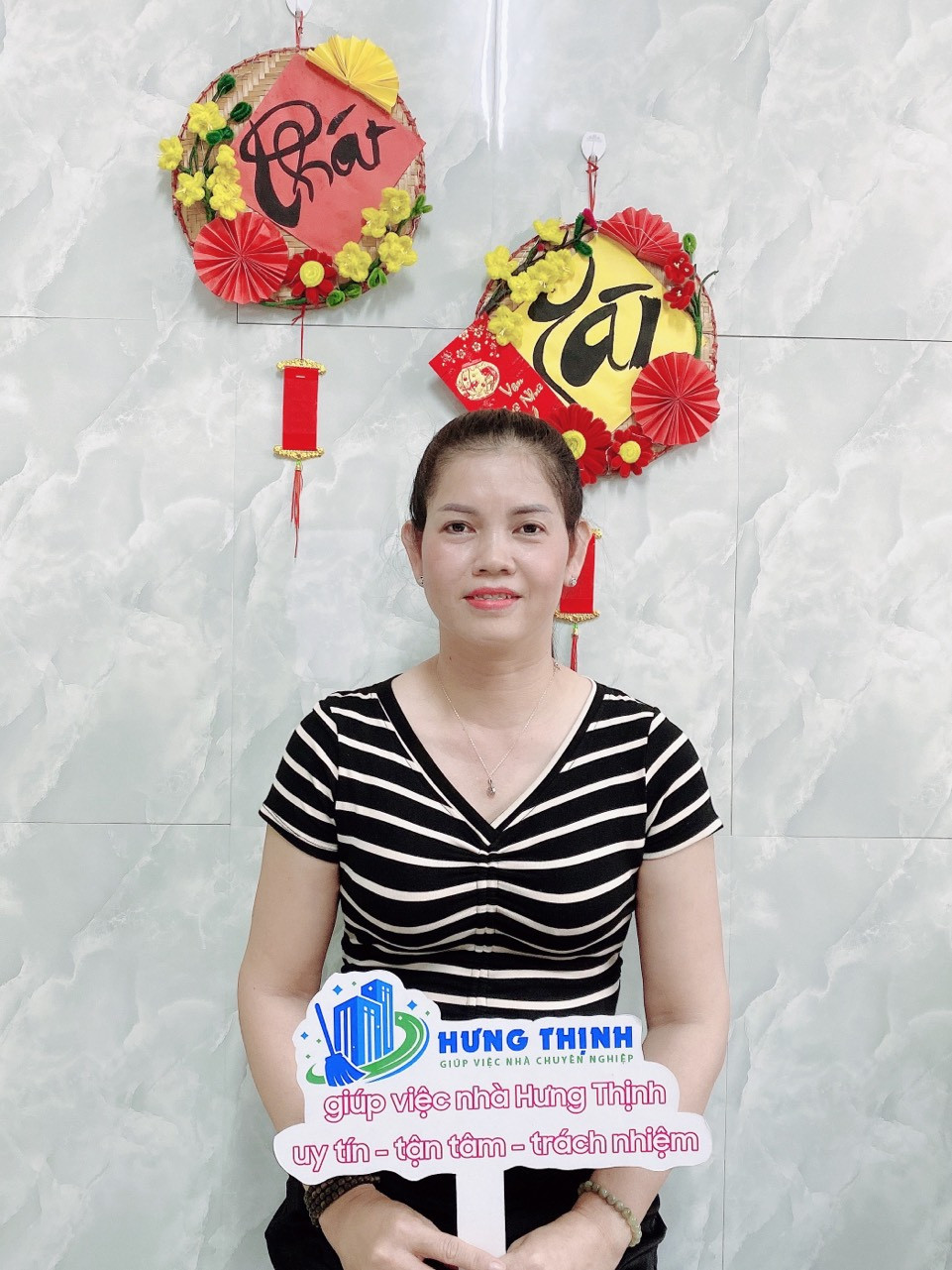 Chị Út chuyên giúp việc nhà chăm bé làm xuyên tết